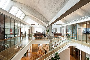 An iconic concrete structure at the disused Paper Factory Dalum in Odense has been transformed into the headquarters of the AG Group. C.F. Møller Architects are the architects behind it. - Among the finalists for Office Building of the Year - C.F. Møller. Photo: Michael Kruse