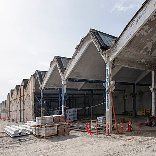 De ikoniske shedtagshuse på Dalum Papirfabrik i Odense transformeres af C.F. Møller Architects til bolig og erhverv. - Blandt finalisterne til Årets Kontorbyggeri - C.F. Møller. Photo: Michael Kruse