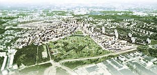 Flygperspektiv över programområdet från sydost, med den stora parken, Årstafältet, i förgrunden.  - Nytt bostadskvarter i Stockholm - C.F. Møller. Photo: Archi.5