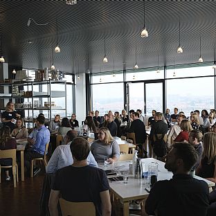 Presentation by Lone Bendorff, CEO and Partner at C.F. Møller Architects in Aarhus - Strong Relations, Inter-cultural Office Sprit and Sustainability: C.F. Møller Architects Facilitates Introduction Day for 70 New Employees - C.F. Møller. Photo: Peter Sikker Rasmussen